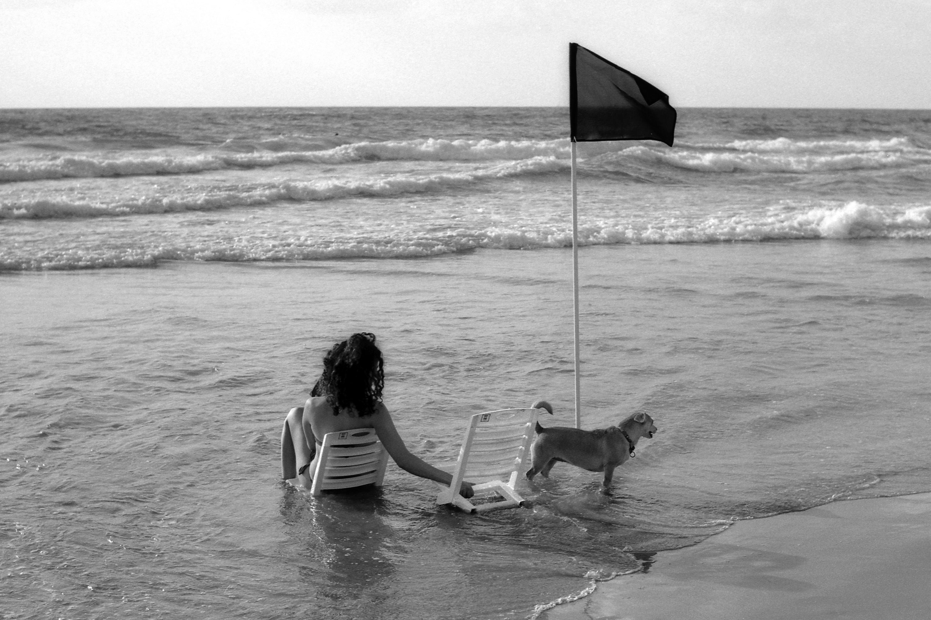 The Beach Guardian And Her Pet Dog, Rasko Beach Near Emek Hefer, Netanya Israel, Ilford Black And White Film 35mm Analogue Photography Print