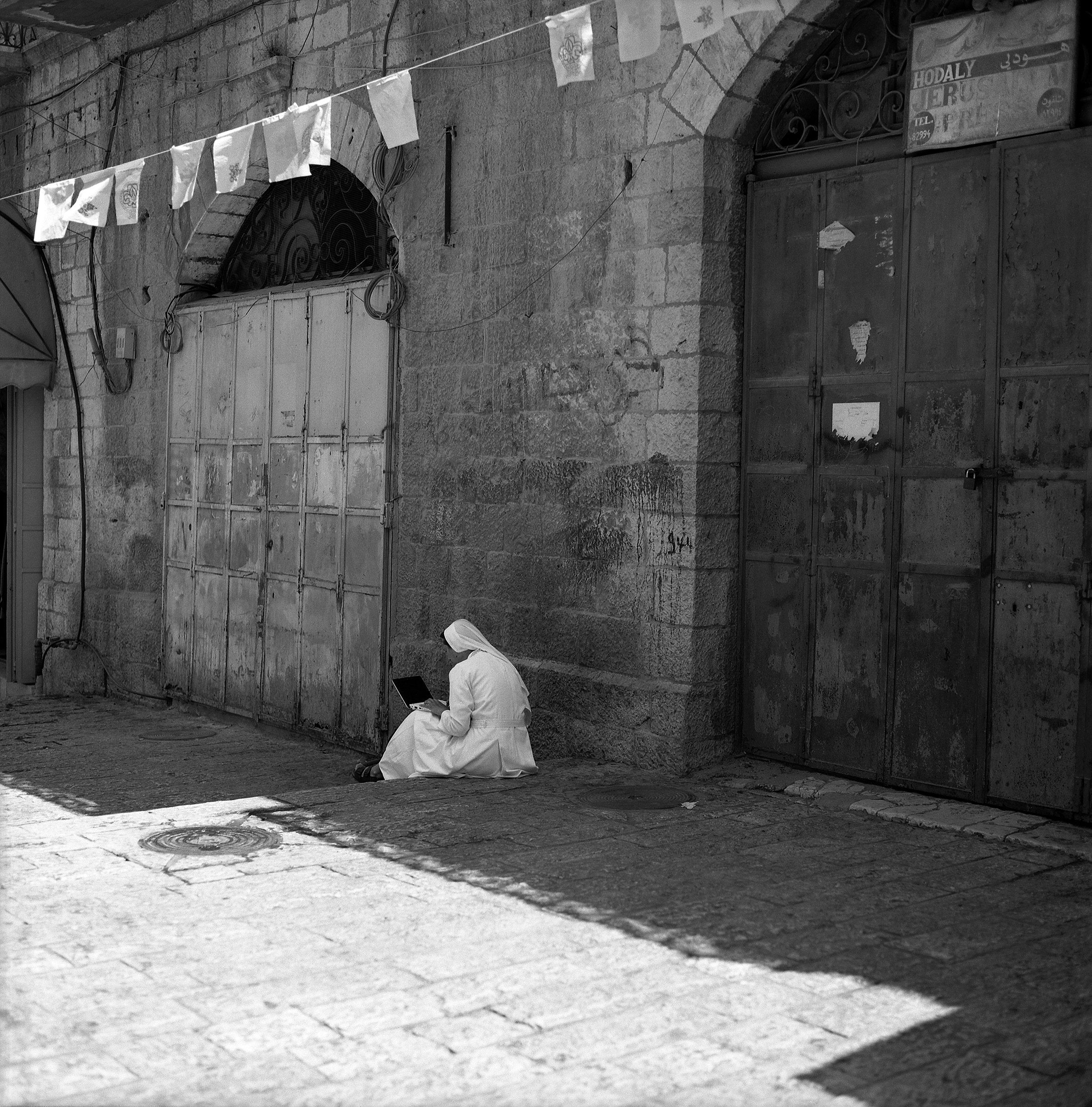 The Technocratic Nun, Suq Aftimos Streets In Jerusalem, Holy Land, Israel, The Calvary Golgotha Hill, Large Size Hasselblad Photo Prints