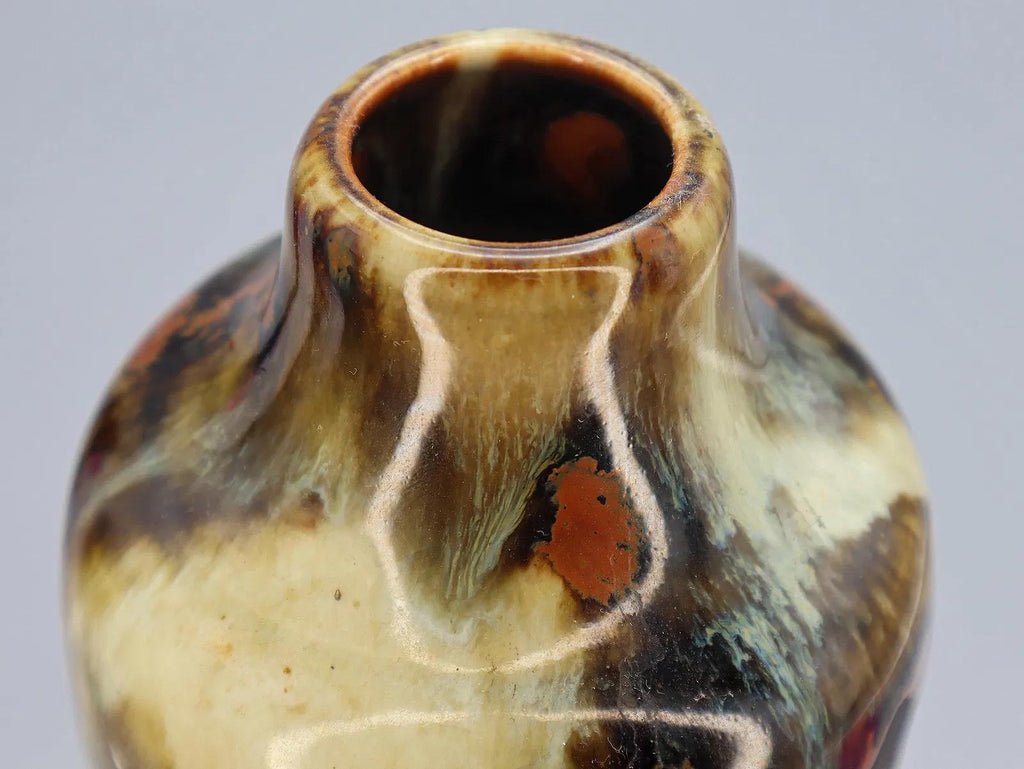 Antique Early 20th Century Japanese Sumida Gawa Drip Pottery Vase. A Tall Dark Brown Vase With Two Applied Figurines Of Old Men, Taisho Era