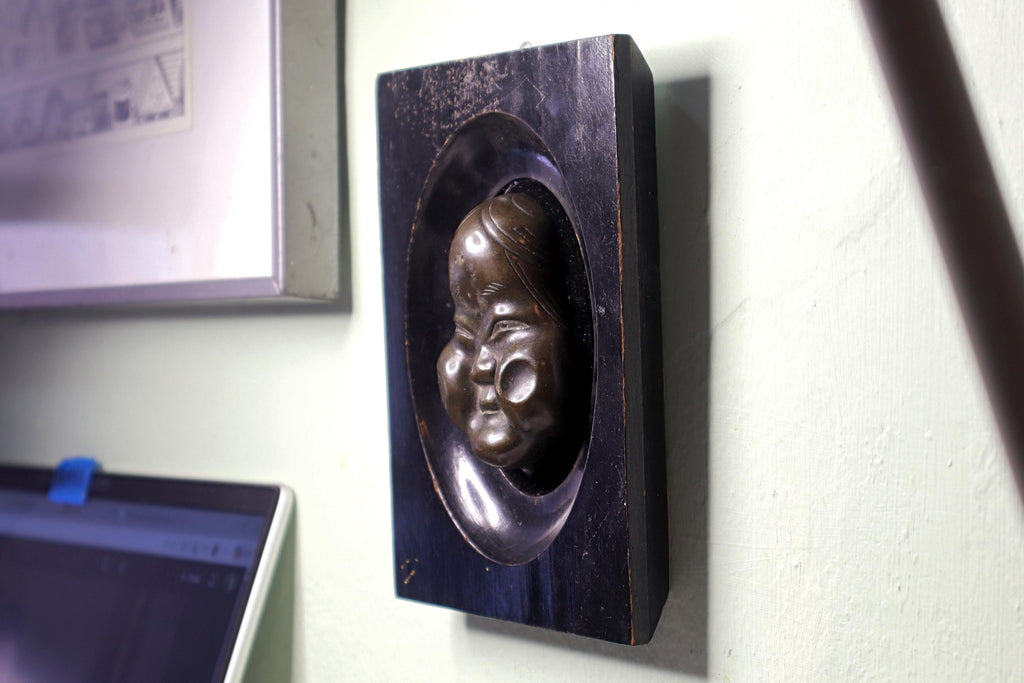 Antique Early 20th Century Taisho Era Japan Decorative Wall Hanging Mask. Okame Otafuku Bronze Miniature Figure On Art Deco Wooden Frame