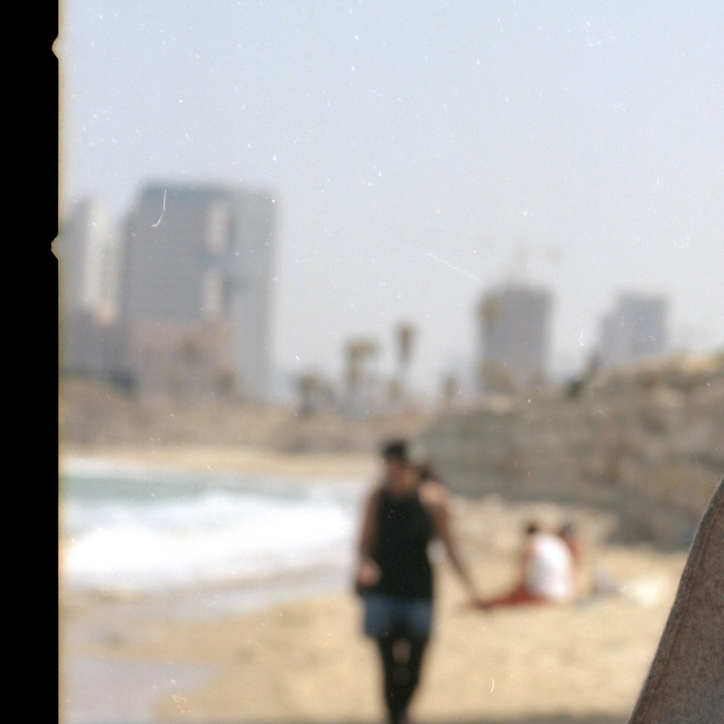 Be Aware Of The Big Brother, Tel Aviv, Israel, Color Analogue Photography Prints 24 x 24 inches, Sunny Seashore, Male Brutalist Fashion