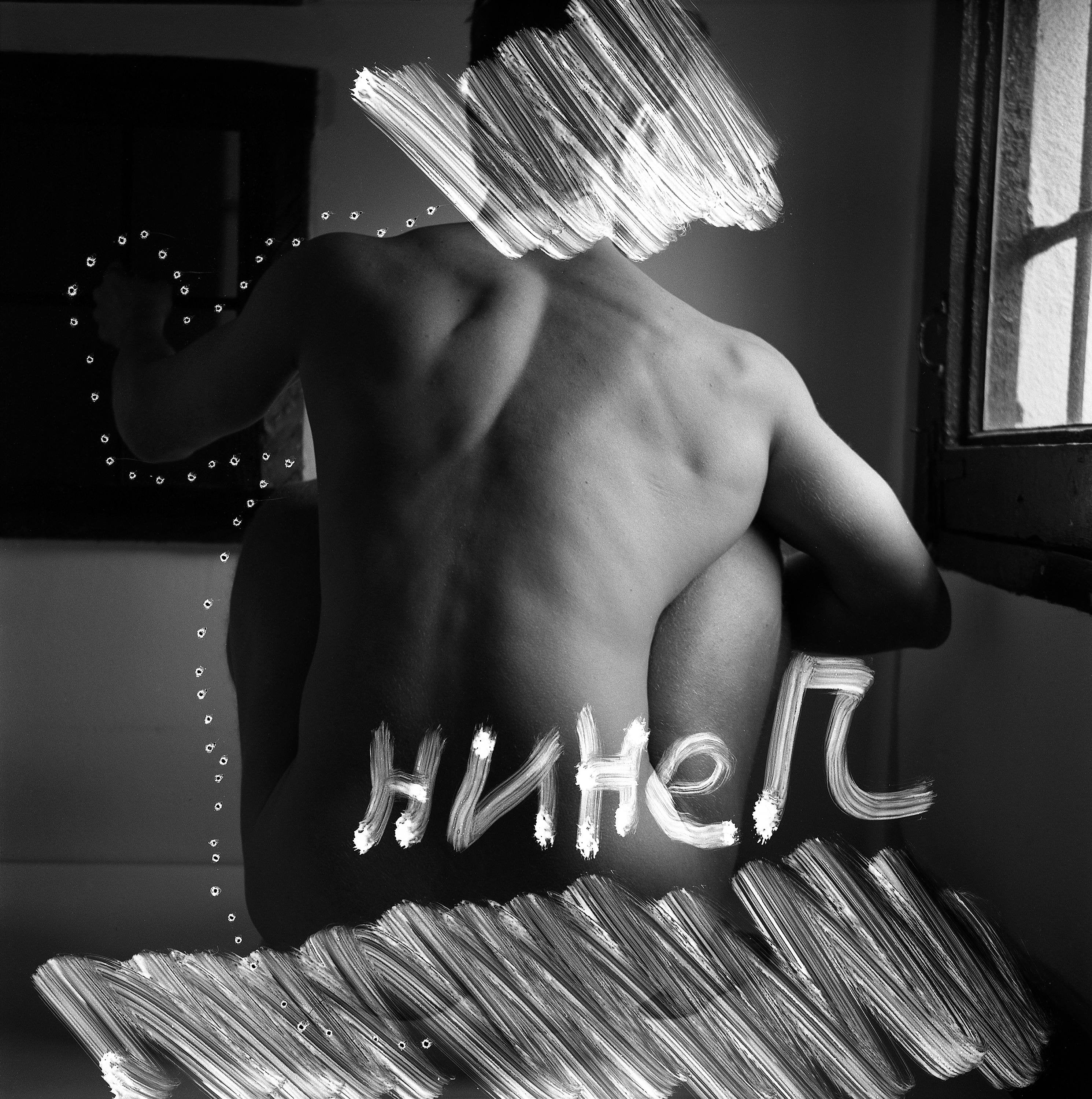 Short letter Lenin, Black and White Photo, Lubitel Medium Format, Analogue Photography, Manipulated Negative Photo, Conceptual Dadaist Photo