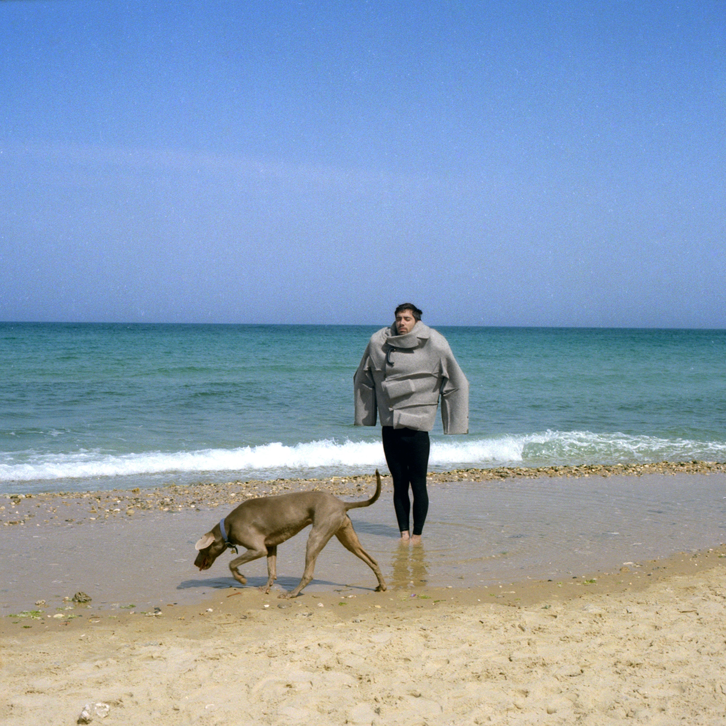 An Idol Of Our Times, Tel Aviv Jaffa Israel, Color Analogue Photography, Sunny Summer Seashore, Jewish Male Model Brutalist Fashion Clothing