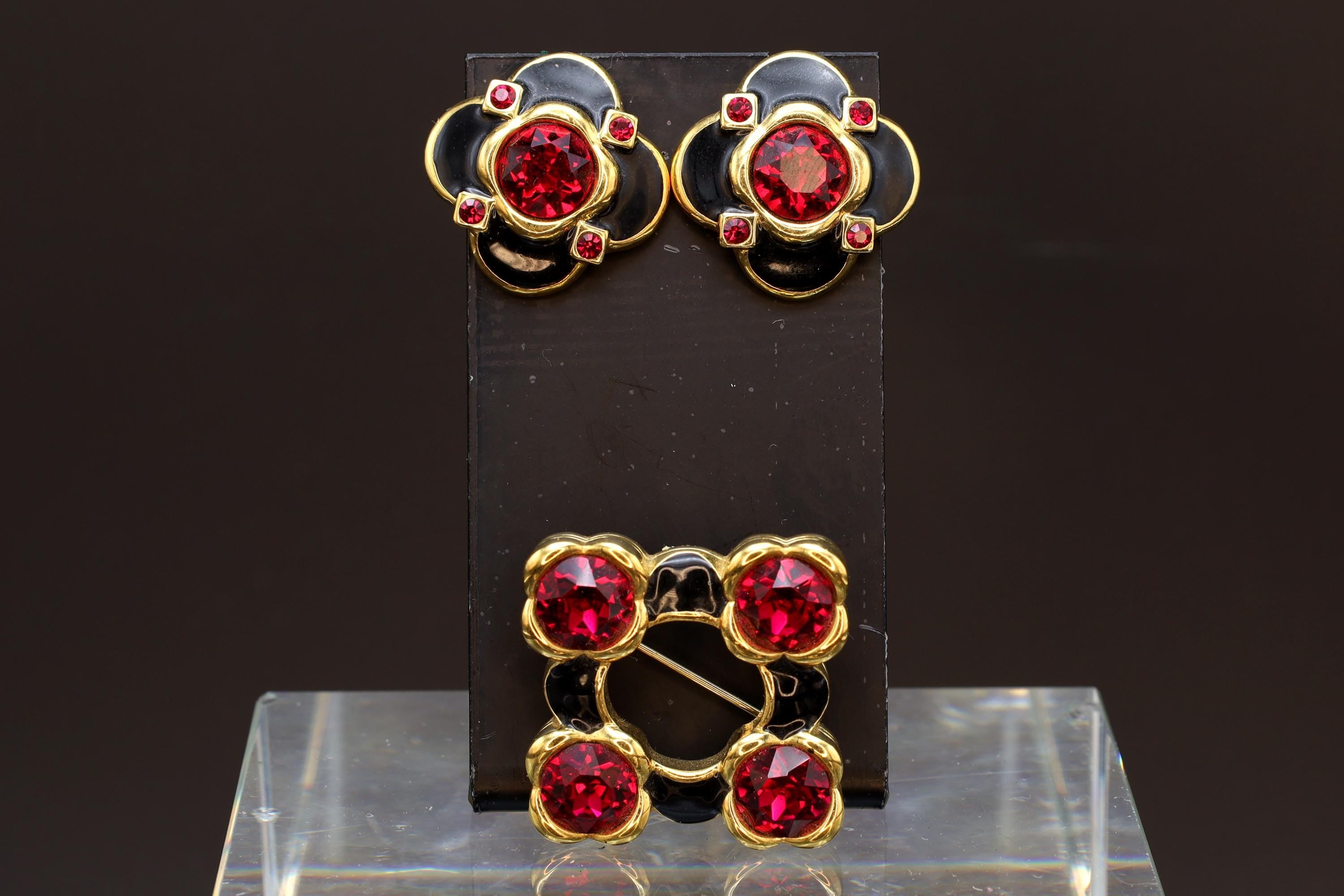 Monet Jewelry Set With Stud Earrings And Brooch Made In The 1980s USA, Gold Tone, Enamel And Ruby Glass Rhinestones