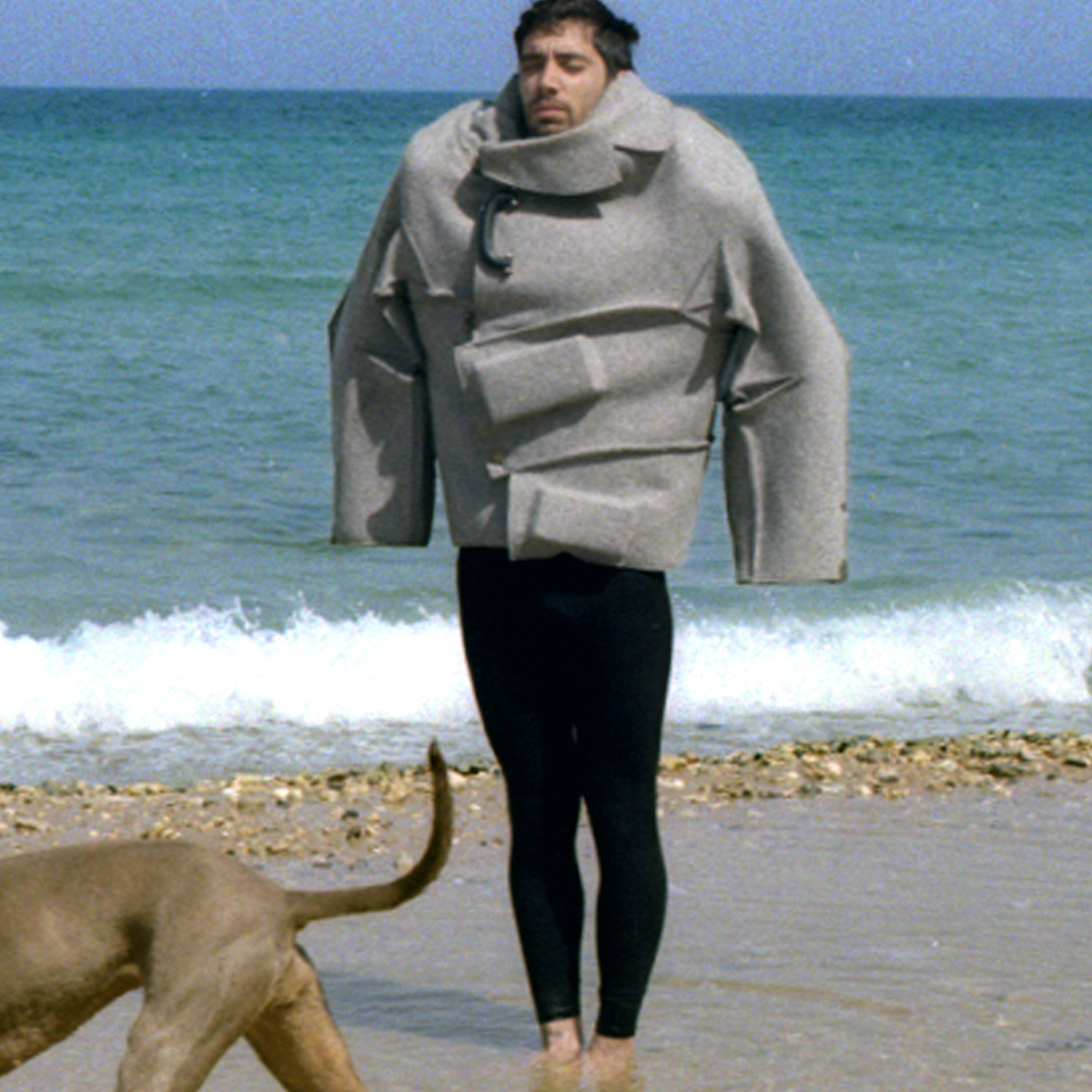 An Idol Of Our Times, Tel Aviv Jaffa Israel, Color Analogue Photography, Sunny Summer Seashore, Jewish Male Model Brutalist Fashion Clothing